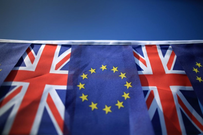In this photo illustration the European Union and the Union flag sit together on bunting on March 17, 2016 in Knutsford, United Kingdom. The United Kingdom will hold a referendum on June 23, 2016 to decide whether or not to remain a member of the European Union (EU), an economic and political partnership involving 28 European countries which allows members to trade together in a single market and free movement across it's borders for cirtizens.