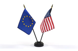 Small flags of European Union and the United States in a stand isolated on a white background. See more flags from this series in my portfolio.