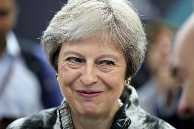 Theresa May wry smile